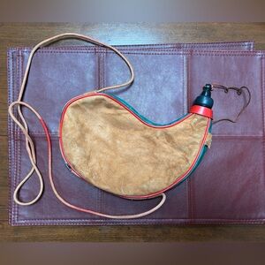 Tan and Red Leather Wine Skin Bottle Bag, vintage-as is.